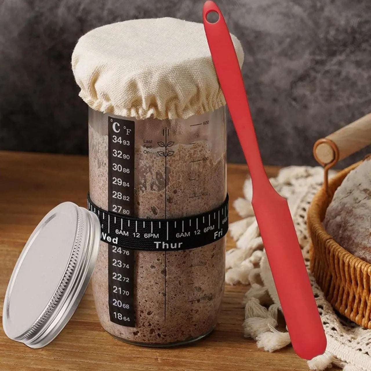 Glass jar with active sourdough starter from the kit
