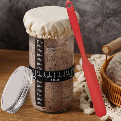 Glass jar with active sourdough starter from the kit